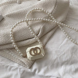 Pearl Chain Crossbody Clutch
